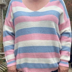 Brand new striped sweater with cute detailed back